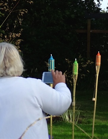 Debbie making a garden video (Allan's photo)
