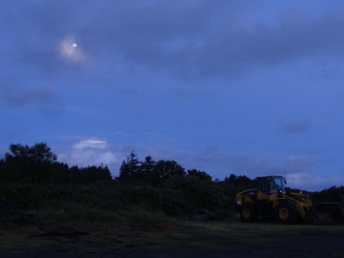 almost full moon over the works yard